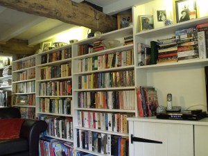 Close up of traditional painted pine bespoke living room units.