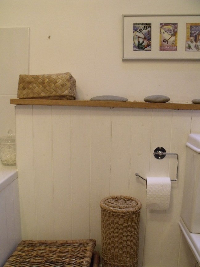 Panelling around bathroom plumbing